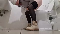 Play European MILF Pisses in Public While Dressed Sexy