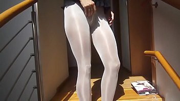 Play Sexy woman with sexy legs putting on 8! layers of pantyhose